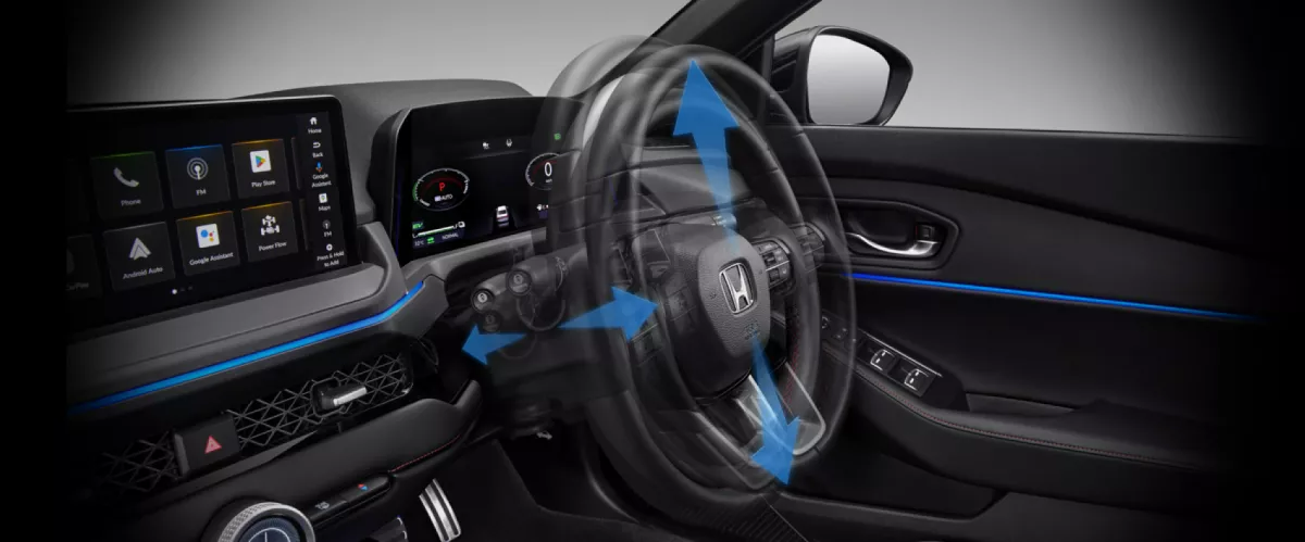 Tilt & Telescopic Steering Wheel
Anda dapat mengatur posisi roda kemudi sesuai dengan postur tubuh Anda, cukup dengan menarik tuas yang terletak di bagian bawah roda kemudi.