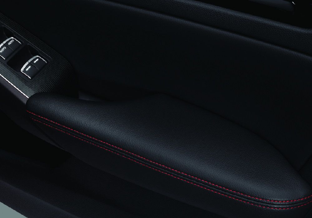 Door Armrest with Red Stitches